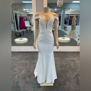 Size 8. Ivory. Off the shoulder. fitted bodycon dress. long train.